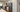 RTA pantry cabinet beside refrigerator in a white shaker kitchen